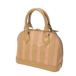 Louis Vuitton Monogram Dune Handbag Vernis Tan Alma